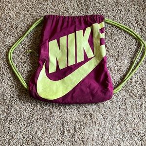 Nike bag, yellow and purple bag, with side pocket and inside pocket, used
